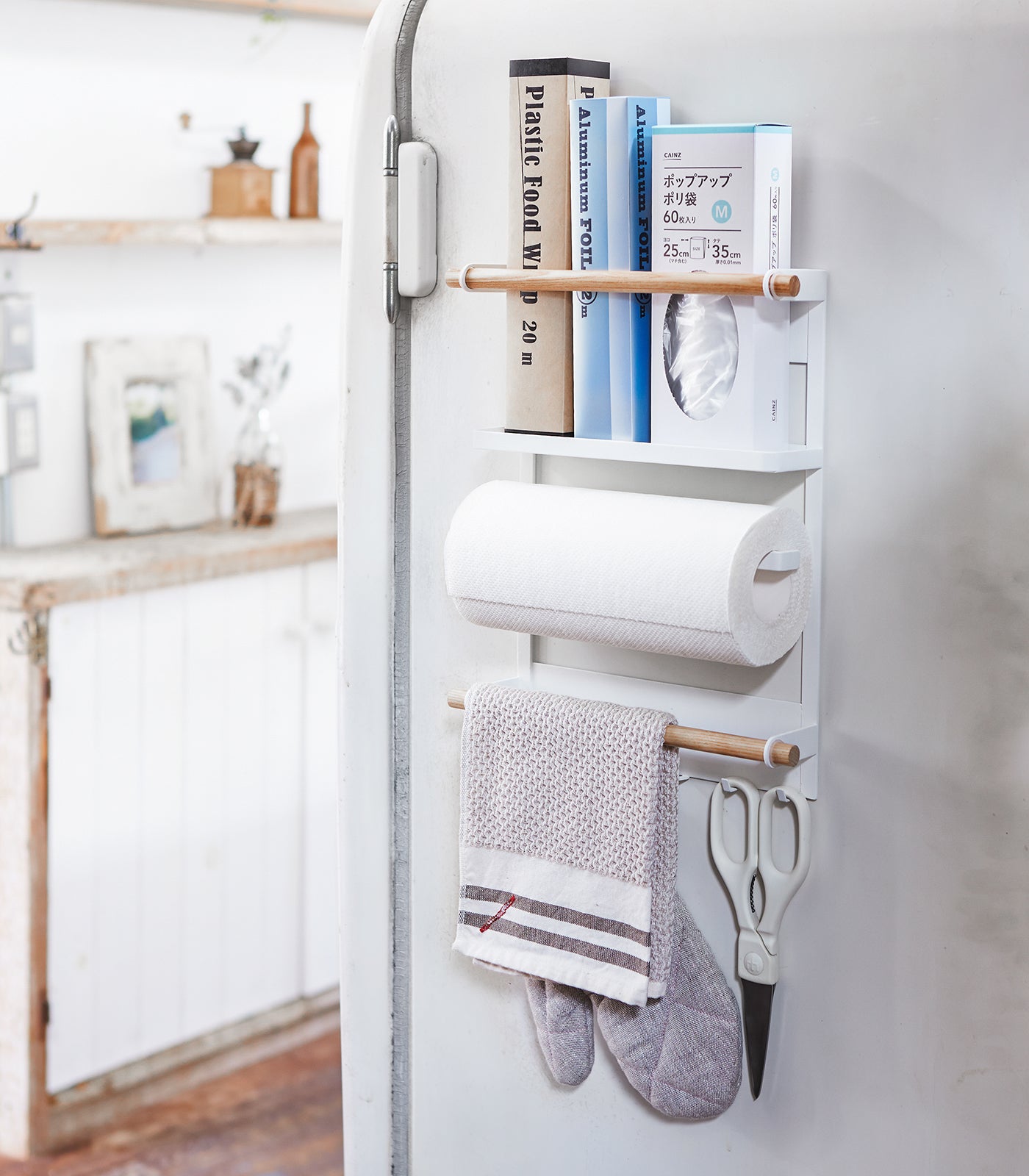 White magnetic refrigerator organizer with wood accent and hooks